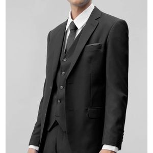 Black three piece suit. 40L, 34 waist, slim fit. Brand new in packaging.